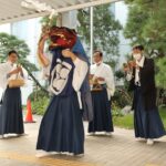 市内を巡る伊勢大神楽一行