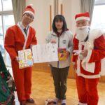 ダイナムから贈られた目録と菓子