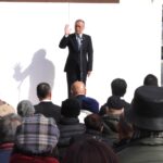 あいさつをする谷口氏