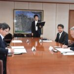 調印する谷口市長と高原支社長