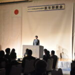 あいさつする國米理事長=岡山県津山市で