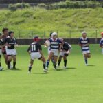 熱戦を繰り広げる選手たち（津山、美作RS合同―倉敷RS）=岡山県美作市で